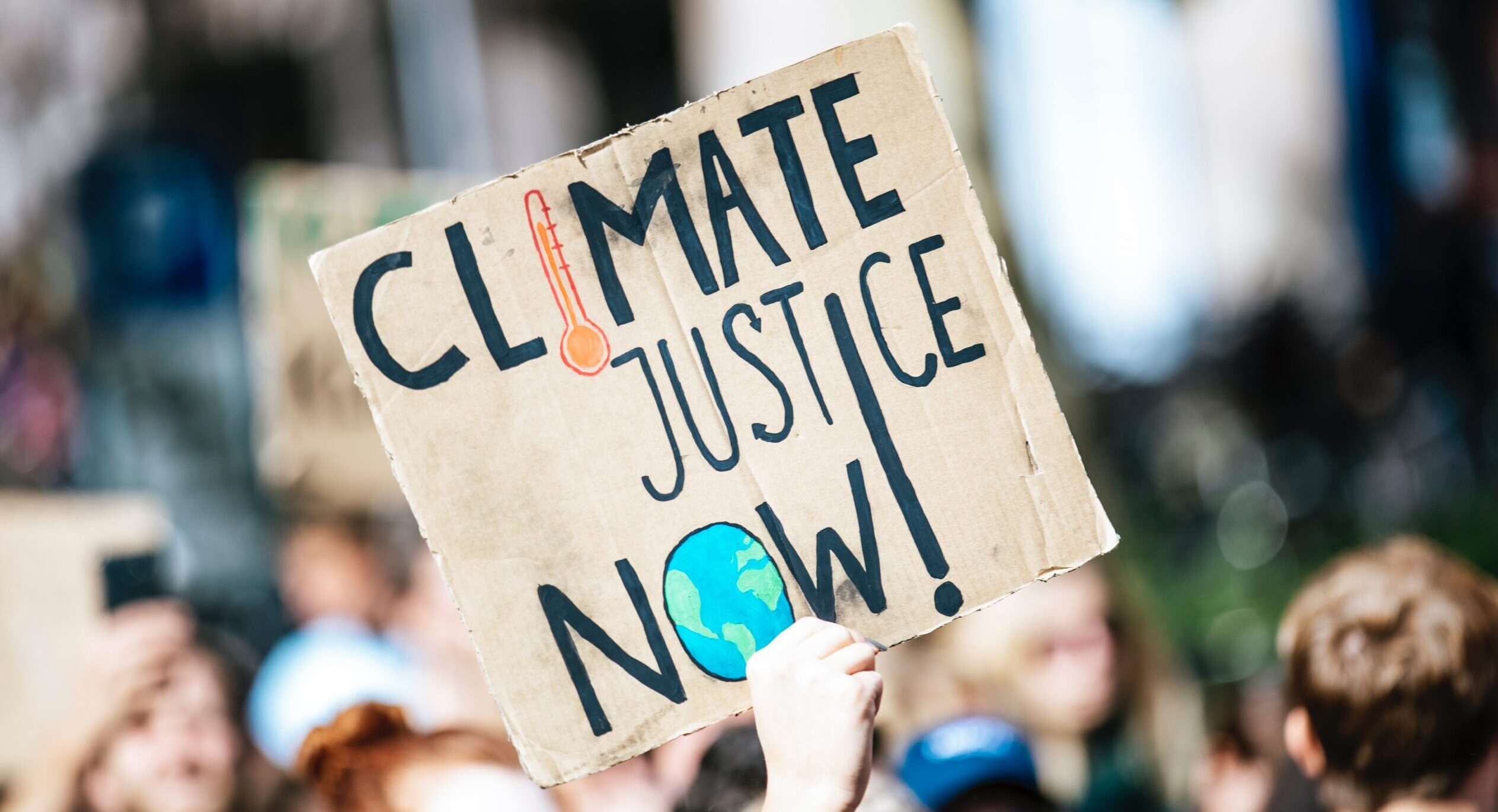 climate justice now sign